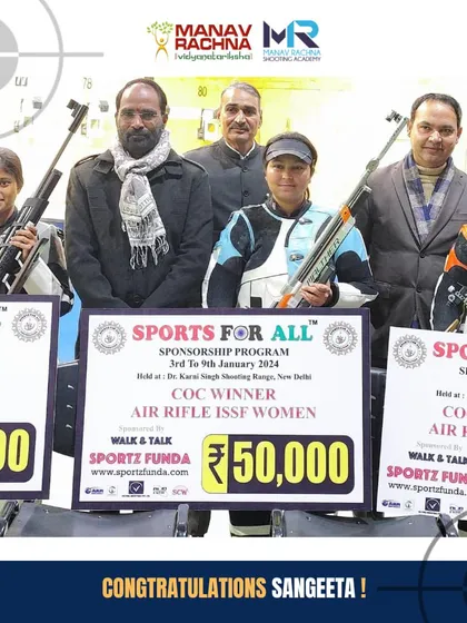 Our coach Sangeeta receives her winner's scholarship of INR 50,000 from the Sports For All Foundation after clinching first place in the 10M Air Rifle Women's event.