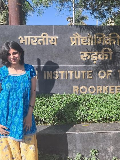 One of our poets at the entrance of IIT Roorkee. We travel across the country to spread the love for spoken word poetry.