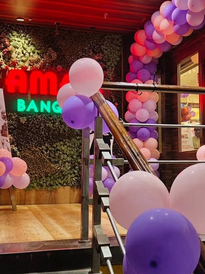 The entrance to the Harry Potter party, with a custom welcome sign and a balloon arch that introduces the theme right away.