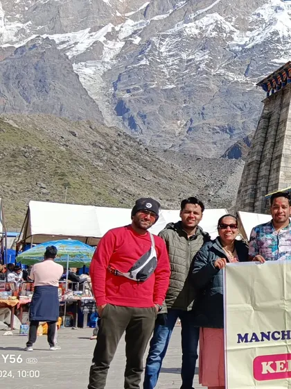 Our team with a happy group of travelers right in front of the Kedarnath temple. We are not just an agency; we are your travel partners, on the ground with you at every step of your spiritual journey.