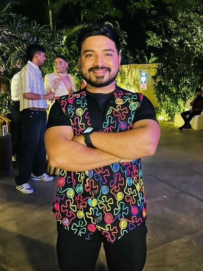 Ankur looking sharp in a colorful vest at an evening event. We love to dress up and celebrate with our community.