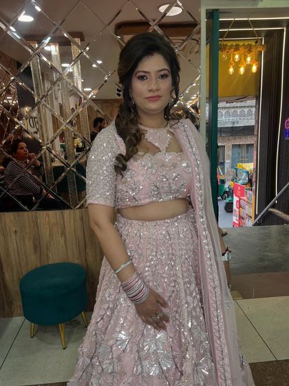 The full look of the pink sequin lehenga, perfect for a reception or sangeet night.