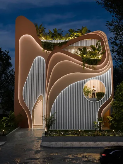 This is our "Water & Wind" residence, where the facade flows like a living sculpture. At night, integrated lighting highlights the structure's organic curves and shifting forms, creating a dramatic interplay of light and shadow that is both shelter and art.