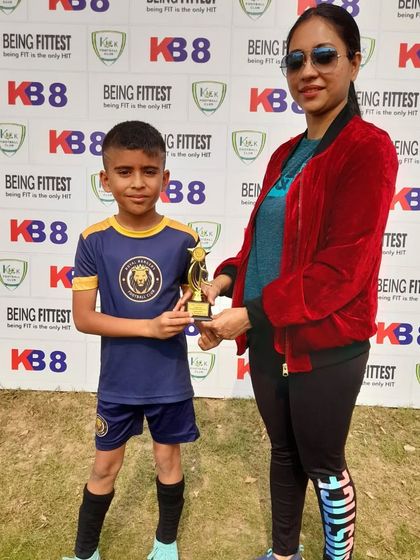 Congratulations to this young champion on being named "Player of the Match."