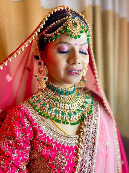 My beautiful bride Jyoti in a vibrant pink lehenga. We did a matching pink eyeshadow look to create a fun, monochromatic style.