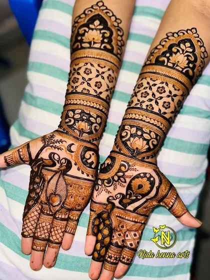 This design was based on the client's choice, featuring a mix of peacock motifs and floral patterns. I always work with my clients to create a design they will love.