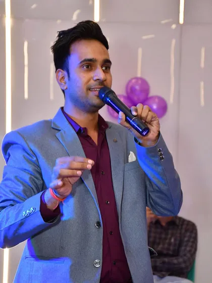 It's showtime at a private event. I love interacting with the audience and making them laugh.