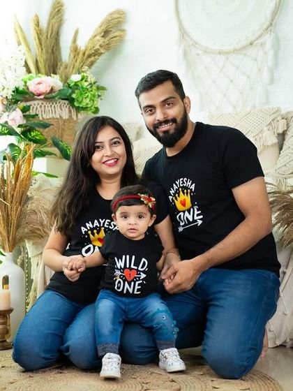 A fun family portrait with matching "Wild One" t-shirts for a first birthday celebration. I love when families bring their own creative ideas to the shoot.