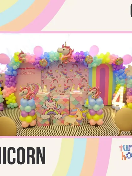 The Unicorn theme is one of our most popular, featuring pastel rainbows, unicorn balloons, and a magical backdrop for a 4th birthday.
