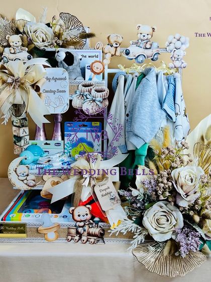 This baby shower hamper was so beautiful we were not ready to see it go. The neutral tones and teddy bear theme make it perfect for any mom-to-be.
