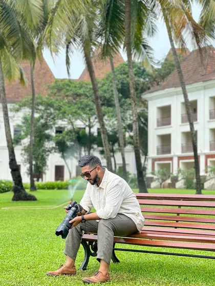 Taking a moment between shoots to review my work. Every detail matters.