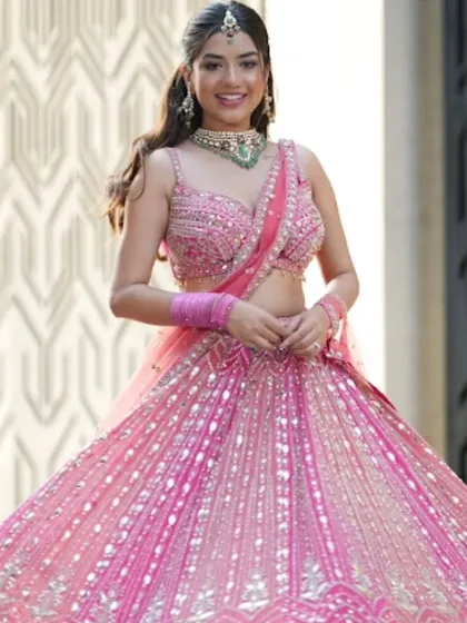 A closer look at the sparkling details. The dupatta is neatly pinned to stay in place, so you can enjoy your event without any worries.