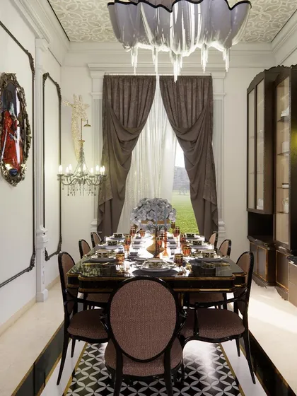A glimpse into the timeless elegance of a classical dining room we designed. Every detail, from the intricate wall mouldings and the ornate chandelier to the custom cabinetry, was chosen to create an atmosphere of pure luxury. This space is perfect for hosting memorable dinners and family gatherings.