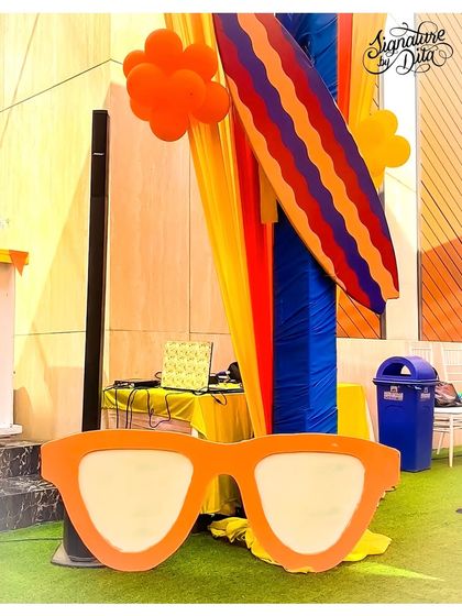 Another fun prop for the Paw Patrol party, these oversized orange sunglasses and a colourful surfboard add to the fun, summery vibe of the event.