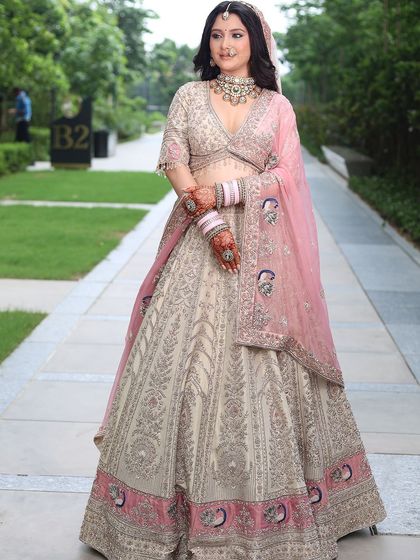 A beautiful bride-to-be in my signature pastel pink and ivory lehenga. The intricate embroidery and the pop of pink on the border and dupatta make it a perfect choice for a day wedding or sundowner pheras.
