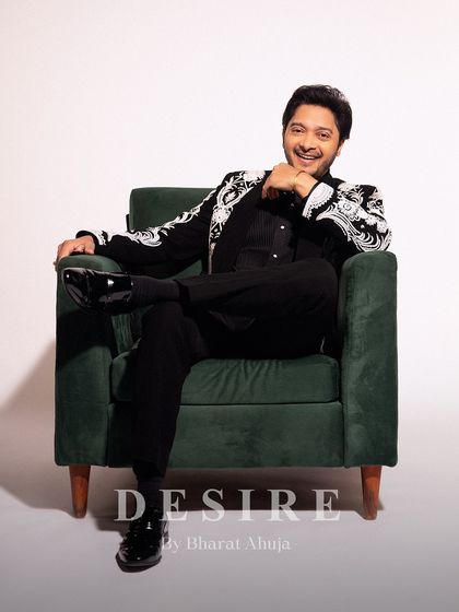 The look of a man who owns his presence. This shot captures the confident and charismatic energy my clothes are designed to inspire. The detailed jacket is the centerpiece of a powerful, modern look.