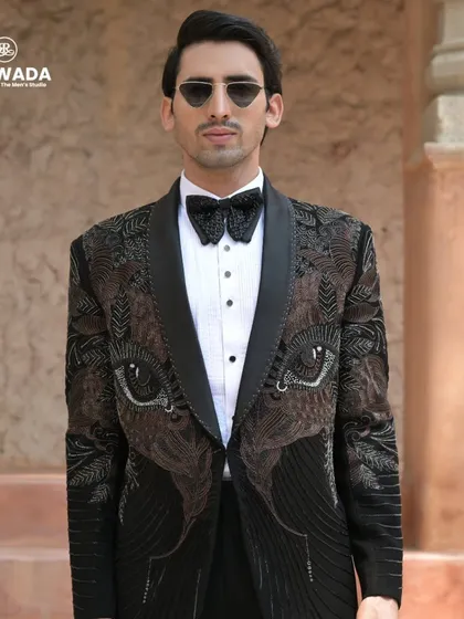 For the bold and artistic groom, this tuxedo from our Crown & Collar collection features a striking eye motif embroidered with beads and thread. It's a conversation starter.
