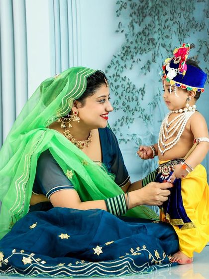 A tender moment between mother Yashoda and her little Krishna. This photo beautifully captures the love and devotion central to the festival of Janmashtami.