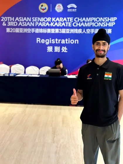 At the registration desk for the 20th Asian Senior Karate Championship. The journey to the podium begins here, with the first official step as a competitor.