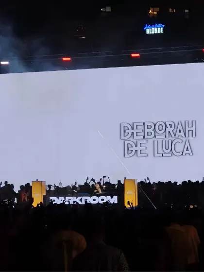 The queen of techno, Deborah De Luca, on the decks at Darkroom. The massive LED screen behind her is a key part of the visual experience we help create.