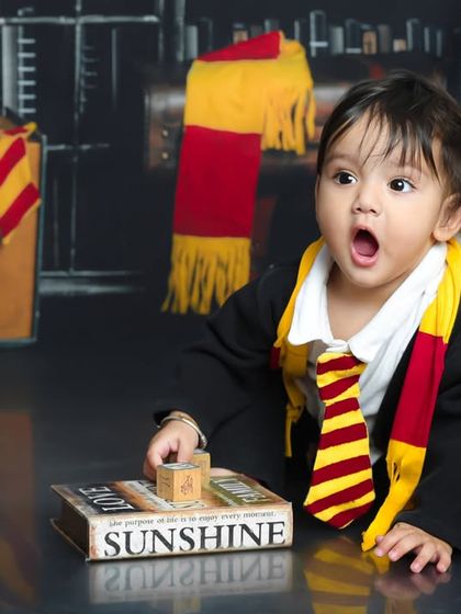 A gasp of magical surprise. This expressive shot captures the awe and wonder of a child discovering the wizarding world for the first time.