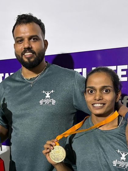 Celebrating a gold medal win with one of our strong female lifters at the 2023 state championships. Her hard work and commitment paid off on the platform.