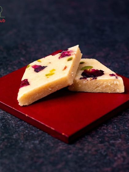 Our Kaju Katli is made with the finest cashews, blended with the freshness of rose petals. This classic Indian sweet simply melts in your mouth.