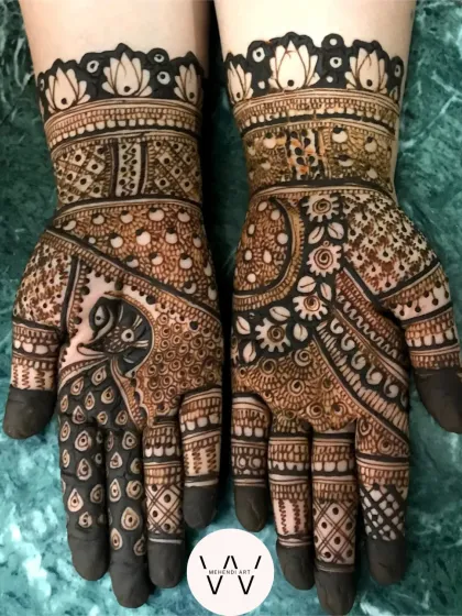 The front-hand design for the anniversary celebration, featuring beautiful peacocks.