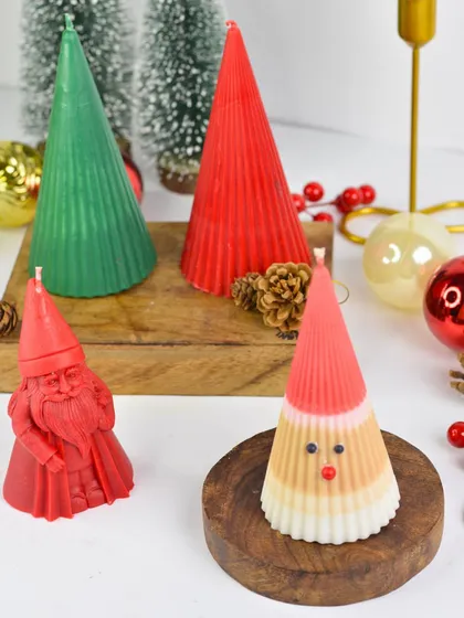 A closer look at my Santa and Christmas tree-shaped pillar candles. These are perfect for creating a festive vignette on your mantelpiece or table.