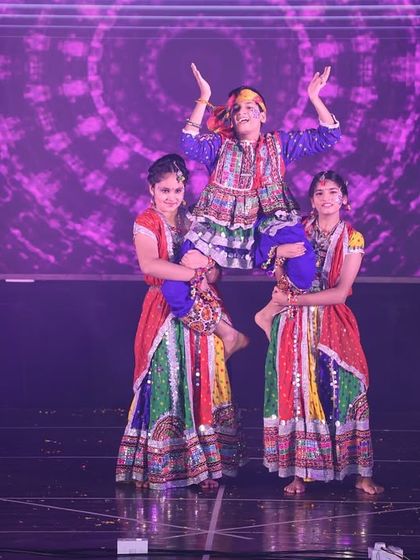 Our Garba routines often include impressive lifts and formations, adding a dynamic and celebratory element to the traditional dance style.