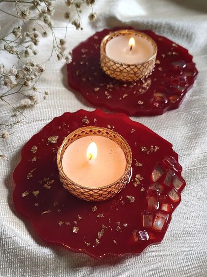 This pair of red geode T-light holders has been a bestseller. The combination of rich color and gold sparkle is perfect for festive gifting.