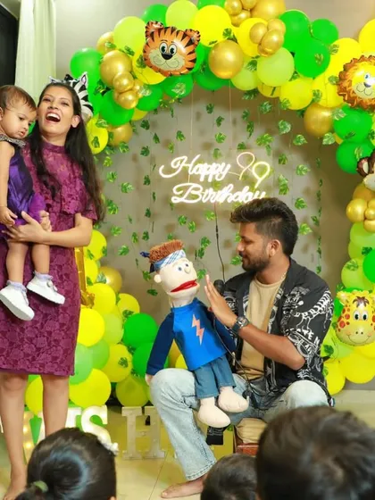 A mother and her child laughing during my performance at a birthday party.