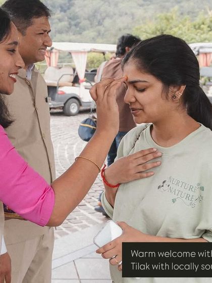 A warm, traditional welcome for guests arriving at a destination wedding. We greet them with a tilak and locally sourced flowers to make them feel special from the moment they arrive.