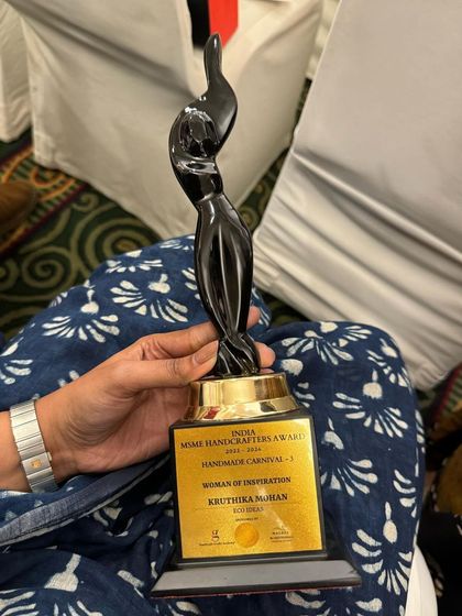 A close-up of the MSME Handcrafters Award for "Woman of Inspiration". This award means the world to me and motivates me to continue sharing the magic of creating with nature.