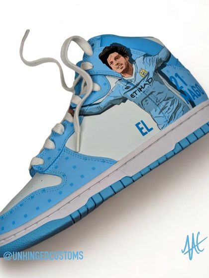 A detailed portrait of David Silva, "El Mago," on the Man City tribute dunks.