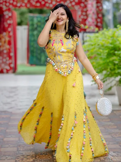 Styling isn't just for the bride and groom. I had so much fun creating this playful and vibrant Haldi look for the sister of the groom in a customized Payal Singhal creation. The whole wedding crew deserves to feel like a main character.