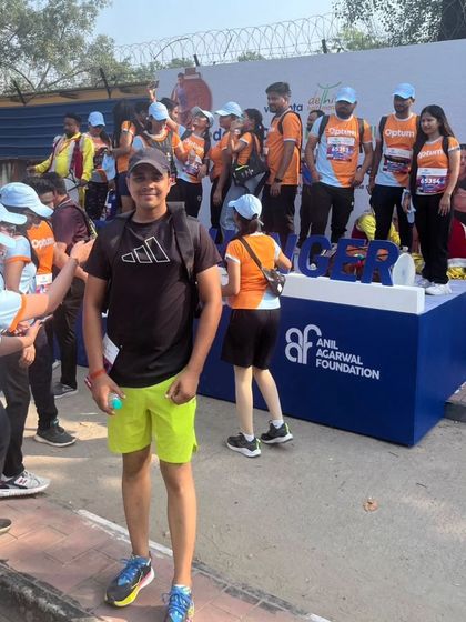 Posing near one of the event stages. The atmosphere of a big city marathon is electric.