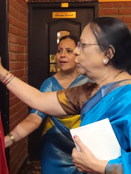Receiving blessings and good wishes from a senior rasika after my performance at Krishna Gana Sabha. The appreciation of the audience is the ultimate reward.
