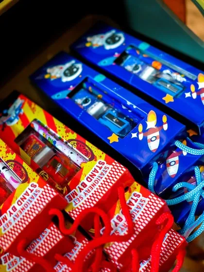 A collection of themed stationery sets ready to be given as party favors.