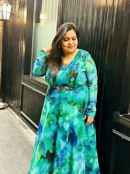 Style is a way to say who you are without having to speak. Here I am in a custom floral gown, ready to help you with your own personalized styling session.