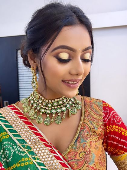 The closed-eye shot highlights the bright, sunny eyeshadow. My courses cover how to use color theory to make bold choices that still look elegant and cohesive.