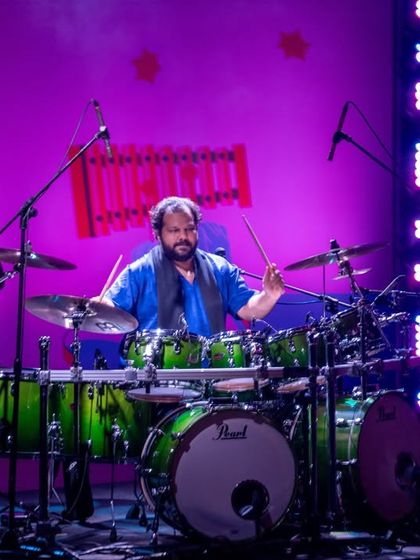 The powerhouse Gino Banks on drums. His energy and precision are a driving force behind our fusion sound.