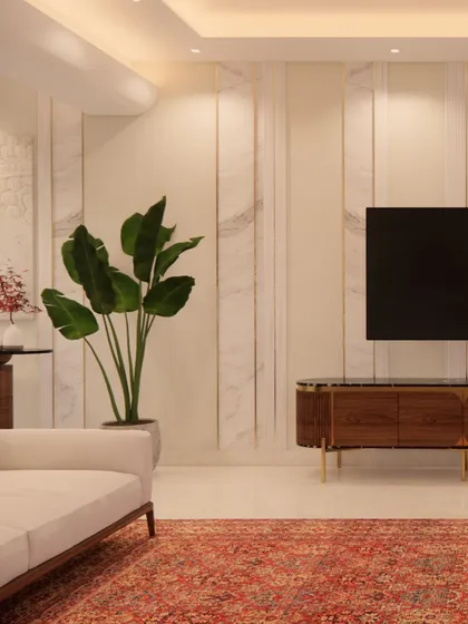 This living room draws you in with its quiet refinement. The feature wall combines marble-finish panels with delicate gold inlays for a touch of elegance. A rich wooden TV console and a bold traditional rug ground the space, creating a perfect balance of contemporary style and classic warmth.
