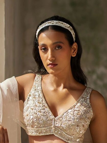 Our elegant handcrafted hairbands are perfect for adding a touch of regality to your festive attire.