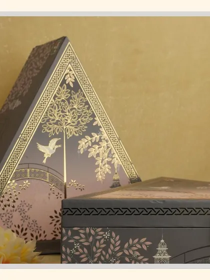 Simple and elegant grey-themed hampers for a peaceful Navratri. These unique triangular and rectangular boxes are perfect for subtle, sophisticated gifting.