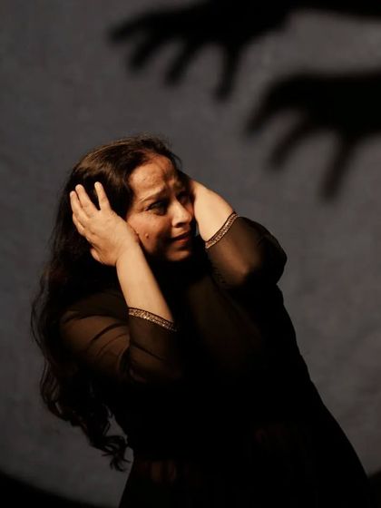 A powerful image depicting fear and adversity, a central theme in 'Quest'. The use of shadow play adds a dramatic layer to the storytelling.