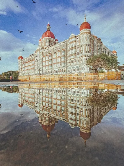 A different take on the famous reflection shot of the Taj Mahal Palace. The vibrant colors and dramatic sky make this a standout frame of Bombay.