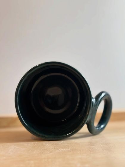 A top-down view of the Forest Green mug, showing the deep, inky color of the interior.