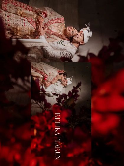 A creative and artistic portrait of the couple lying down, their heads together, with a dramatic red floral overlay.