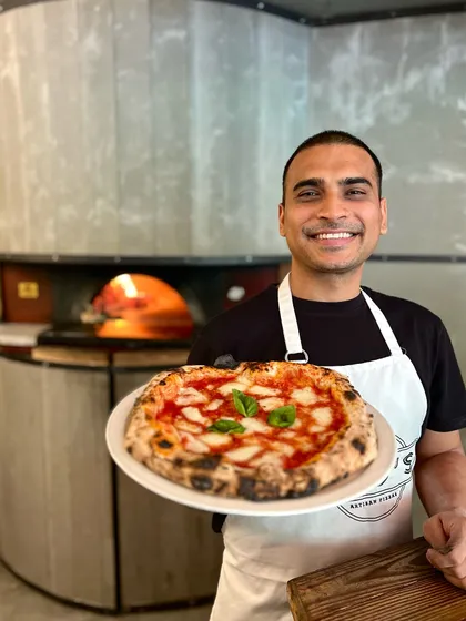 The classics never get old. Holding up a freshly baked Margherita is always a proud moment.